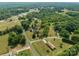 This aerial view highlights the home's location amidst a verdant landscape, conveniently near the highway at 7271 Hallman Mill Rd, Vale, NC 28168