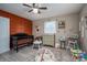 Bedroom featuring modern crib, ample flooring for play and toys, and natural lighting at 7271 Hallman Mill Rd, Vale, NC 28168