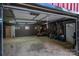 Bright storage building/garage featuring a concrete floor and neutral colored walls for storing your equipment at 7271 Hallman Mill Rd, Vale, NC 28168