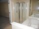 Bathroom with shower and bathtub at 8319 Golf Ridge Dr, Charlotte, NC 28277