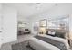 Staged bedroom featuring neutral decor, a comfortable bed, and bright windows at 8410 Scotney Bluff Ave, Charlotte, NC 28273