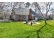 Lush backyard with a patio area, perfect for outdoor entertaining and relaxation at 916 Somersby Ln, Matthews, NC 28105