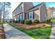 Well-maintained home featuring tidy landscaping and a classic design, capturing suburban charm at 916 Somersby Ln, Matthews, NC 28105