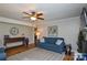 Inviting living room with hardwood floors, a blue sofa, and plenty of seating at 916 Somersby Ln, Matthews, NC 28105