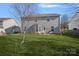 Spacious backyard featuring a patio set and wooden fence, perfect for outdoor entertaining at 1009 Rocky Meadows Ln, Concord, NC 28025