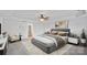 Staged bedroom showcases neutral color palette, stylish furniture and decor at 1009 Rocky Meadows Ln, Concord, NC 28025