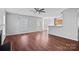 Open living room with fireplace, leading into kitchen breakfast nook area creating a functional and inviting living space at 1009 Rocky Meadows Ln, Concord, NC 28025