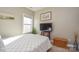 Bedroom featuring a full-sized bed and neutral decor at 116 Paradise Hills Cir, Mooresville, NC 28115