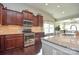 Well-equipped kitchen boasts granite countertops, stainless steel appliances, and ample cabinet space for storage at 116 Paradise Hills Cir, Mooresville, NC 28115