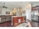 Modern kitchen island featuring stainless steel appliances, granite countertops, and stylish pendant lighting at 116 Paradise Hills Cir, Mooresville, NC 28115