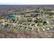 High angle view of neighborhood, showcasing landscaping, streets, and housing layout at 1161 Woodwinds Dr, Waxhaw, NC 28173