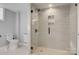 Sleek bathroom featuring a glass shower enclosure with modern fixtures and a white tile design at 1206 9Th Nw St, Hickory, NC 28601