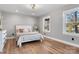 Comfortable bedroom with natural light, neutral walls, and hardwood floors, creating a serene and inviting atmosphere at 1206 9Th Nw St, Hickory, NC 28601