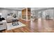Spacious living room with hardwood floors, wood accent wall, open layout and plenty of natural light at 1206 9Th Nw St, Hickory, NC 28601