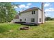 Nice backyard with fire pit and dark wooden deck; perfect for outdoor gatherings at 1226 Flint Ct, Matthews, NC 28104