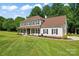 Inviting two-story home with a spacious front yard and attractive landscaping at 1226 Flint Ct, Matthews, NC 28104