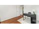 Bright office space with hardwood floors, modern desk, and natural light at 1226 Flint Ct, Matthews, NC 28104