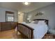 A traditionally styled bedroom with wood flooring, a large bed and a dresser at 12928 Sickles Dr, Charlotte, NC 28273