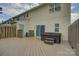 Large wooden outdoor deck featuring a hot tub, providing a perfect space for relaxation at 12928 Sickles Dr, Charlotte, NC 28273