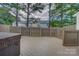 Spacious outdoor wooden deck area perfect for relaxation, featuring a hot tub and fenced in area at 12928 Sickles Dr, Charlotte, NC 28273