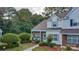 Charming two-story townhouse with a well-manicured front yard and a welcoming entrance at 12928 Sickles Dr, Charlotte, NC 28273