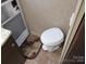 RV bathroom showing toilet, door, and floor at 131 Twin Bluff Trl # 40, Mount Gilead, NC 27306