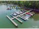 Aerial view of boat docks, showing many boats, providing easy access to water activities at 142 Tuscany Trl, Mooresville, NC 28117