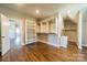 Spacious walk-in closet with custom shelving and hardwood floors, providing ample storage at 142 Tuscany Trl, Mooresville, NC 28117