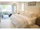 Airy bedroom with a luxurious bed, neutral tones, and a private balcony at 17048 Jetton Rd, Cornelius, NC 28031