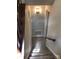 Descending staircase with carpet steps, railing, and a view of the hallway and its fixtures at 1707 Van Dyke Dr, Charlotte, NC 28213