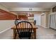 Finished basement with a wooden table, chairs, and small decorative details at 1925 S Lafayette St, Shelby, NC 28152