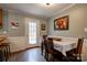 Cozy dining room with natural light and direct access to the backyard, perfect for entertaining at 1925 S Lafayette St, Shelby, NC 28152