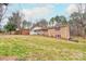 Brick home with a covered porch and landscaped front yard at 1925 S Lafayette St, Shelby, NC 28152