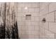 Modern bathroom features white subway tile, chrome fixtures, and a rain shower head at 1925 S Lafayette St, Shelby, NC 28152