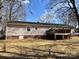 View of house with back deck, showcasing its charming design and highlighting its outdoor entertainment space for gatherings at 1937 Hickory Dr, Lancaster, SC 29720