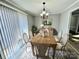 Elegant dining room with rustic wood table and stylish decor at 1937 Hickory Dr, Lancaster, SC 29720