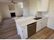 Modern kitchen featuring white cabinetry, stainless steel appliances, and sleek countertops at 1941 Olsen Ln, Charlotte, NC 28213