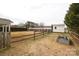 Fenced backyard featuring a shed, garden bed and mature trees at 2003 Hemby Commons Pkwy, Indian Trail, NC 28079