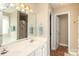 Bathroom featuring a double vanity, a large mirror, and a bath tub at 2003 Hemby Commons Pkwy, Indian Trail, NC 28079