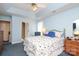 Bedroom features blue walls, blue carpet, and lots of natural light at 2003 Hemby Commons Pkwy, Indian Trail, NC 28079