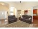 Spacious living room with archway, recessed lighting, comfortable seating and seamless flow to dining and kitchen at 2003 Hemby Commons Pkwy, Indian Trail, NC 28079