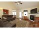 Comfortable living room with a vaulted ceiling, fireplace, and TV, creating a cozy and inviting atmosphere at 2003 Hemby Commons Pkwy, Indian Trail, NC 28079