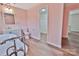 Bathroom with a soaking tub, updated vanity, toilet, doorway to walk in closet and neutral paint at 2025 Sojourn Rd, Marshville, NC 28103