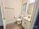 Bright bathroom featuring modern vanity with light fixtures and hardware at 2025 Sojourn Rd, Marshville, NC 28103