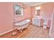 Charming bathroom with clawfoot tub, elegant chandelier, and updated vanity at 2025 Sojourn Rd, Marshville, NC 28103