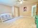 Bright bedroom features a closet, carpeted floors, and ample natural light; it's ready for personalization at 2025 Sojourn Rd, Marshville, NC 28103