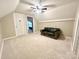 Attic bonus room with a loveseat sofa at 2025 Sojourn Rd, Marshville, NC 28103