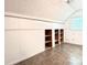 Bonus room with custom built-in shelves and a window offers a versatile space for various activities at 2025 Sojourn Rd, Marshville, NC 28103
