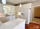 Bright kitchen with white cabinets, white countertops, and modern appliances creating a functional workspace at 2025 Sojourn Rd, Marshville, NC 28103