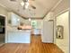 Bright kitchen with white cabinets, white countertops, and modern appliances creating a functional workspace at 2025 Sojourn Rd, Marshville, NC 28103